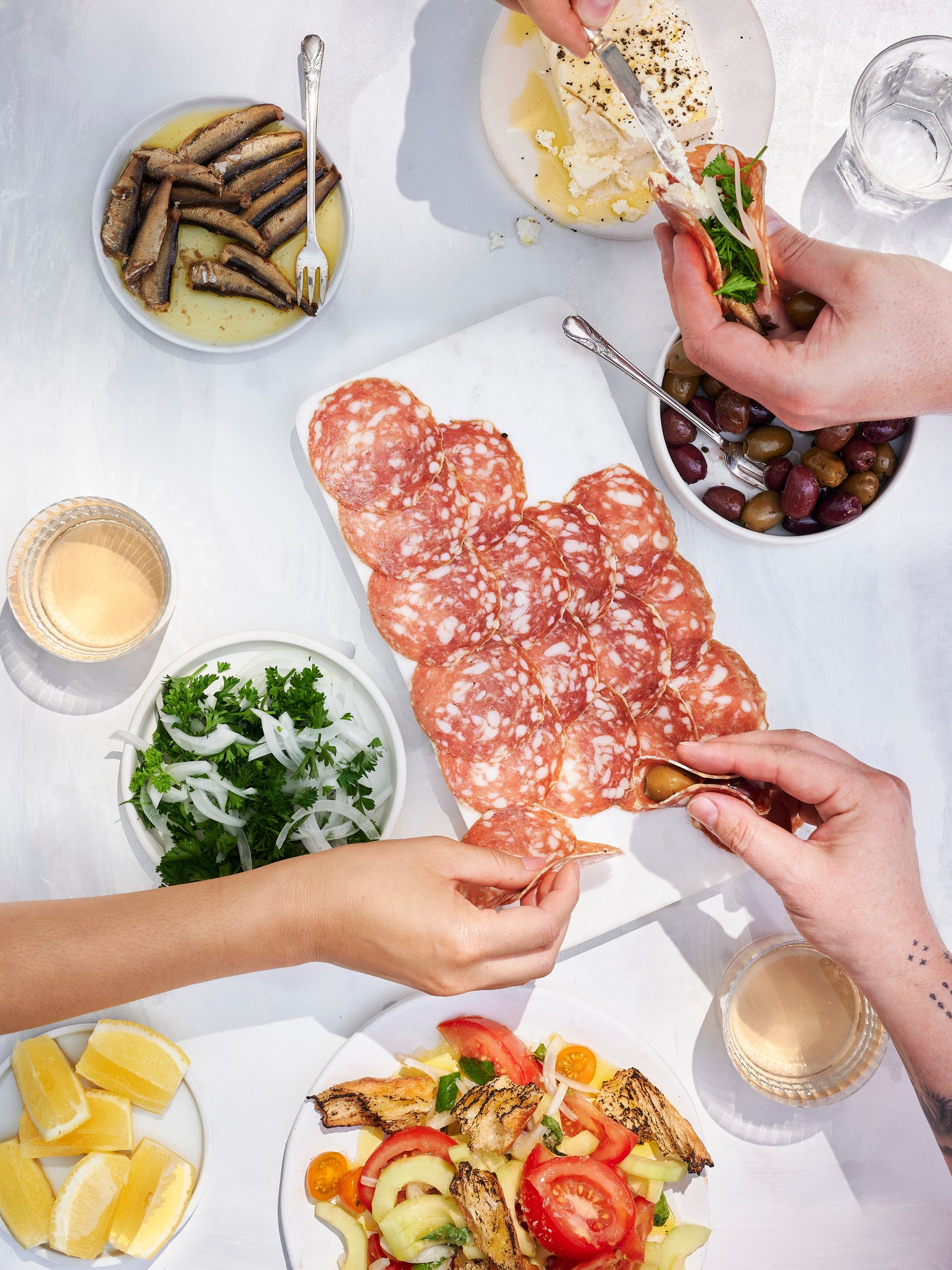 Sliced salami on plate.